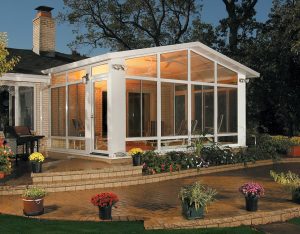 Beautiful sunroom with extended outdoor patio.