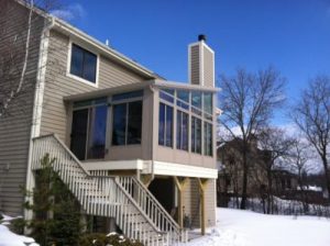 Waukesha, Wisconsin home during winter with luxurious insulated sunroom.